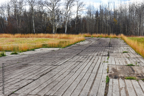 Photography An image of wooden swamp mats used to create temporary road access and preserve the environment