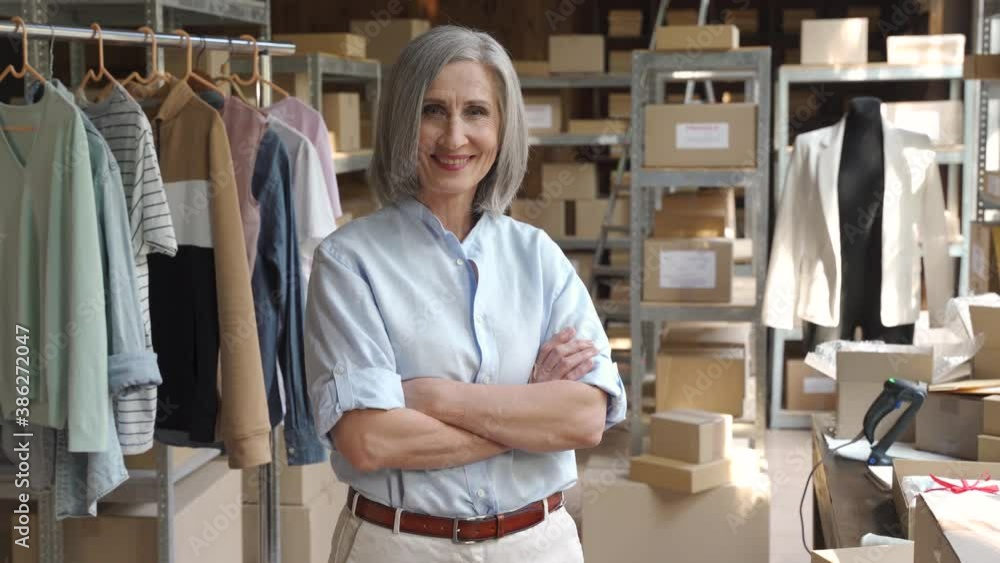 Confident happy mature older 60s woman retail seller, entrepreneur ...