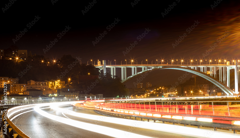 night view of the Arrabida bridge in Porto in Portugal - Oporto. night view of the Arrabida bridge in Porto in Portugal - Oporto.