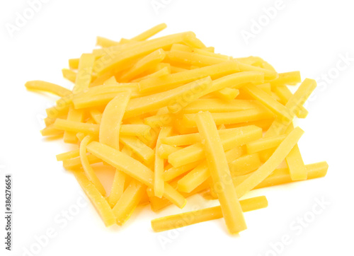 Cheddar cheese slices on white background.