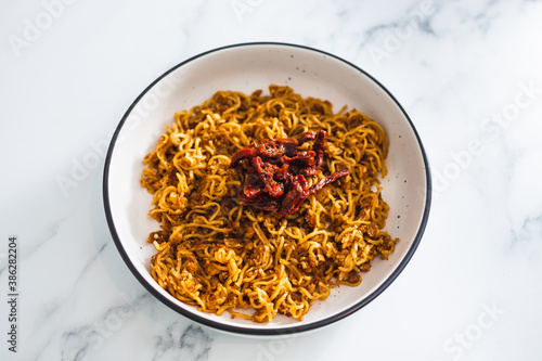 plant-based food, vegan ginger noodles with sundried tomatoes