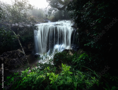 Landscape of waterfall in wet season.