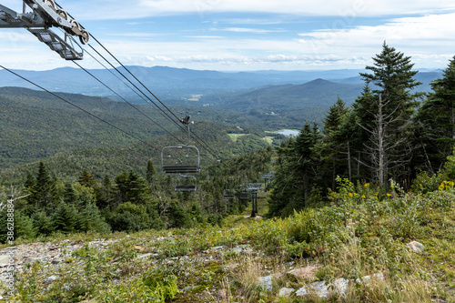 The chairlifts of Stowe, Vermont sit silently, waiting for the snow to fall and skiers to arrive