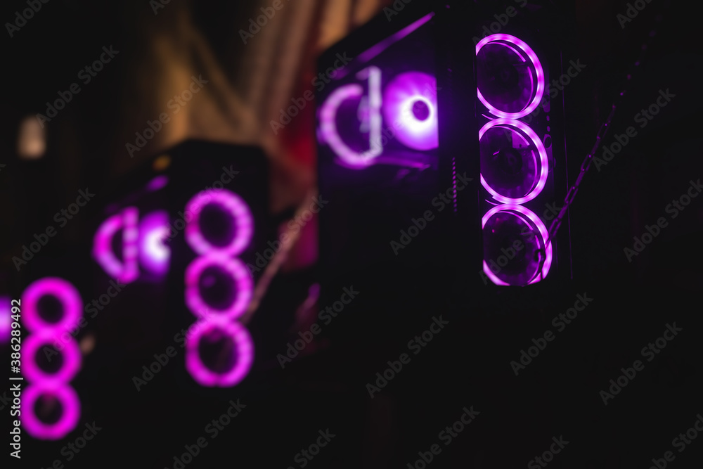 View of Gaming PC with rgb led lights, powerful high end personal computer, assembled with hardware components, at home or in cybersport arena View of Gaming PC with rgb led lights, powerful high end personal computer, assembled with hardware components, at home or in cybersport arena