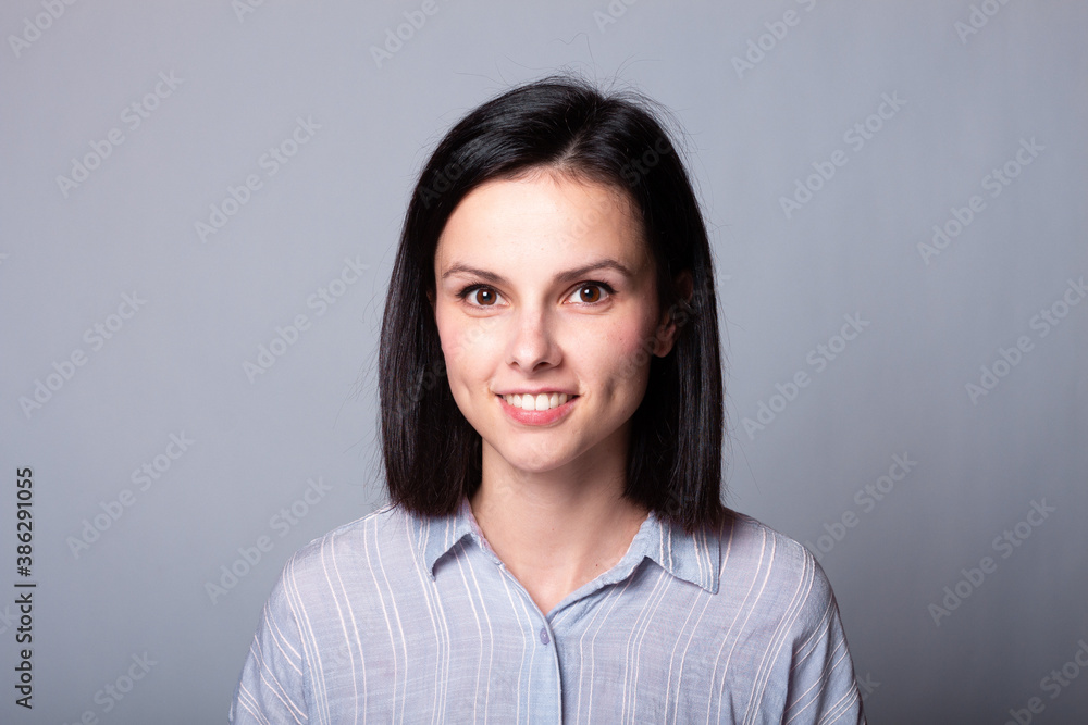 smile woman on a gray background smile woman on a gray background