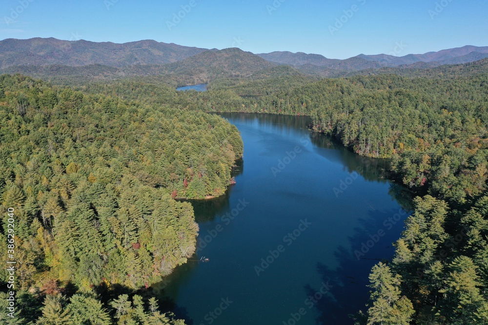 Aerial view of Lake Santeetlah, North Carolina and surrounding national forests in autumn color.