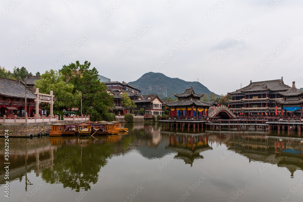 Architecture at Riverside Scene at the Pure Moon Festival, one of Hengdian World Studios in Dongyang, Jinhua, Zhejiang, China. Recreation of famous Song dynasty painting.