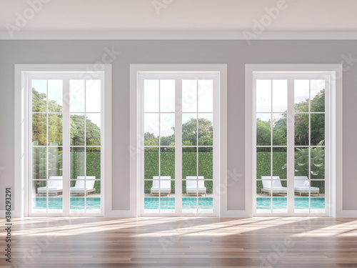 Empty classical style with swimming pool background 3d render, The room has wood floor gray wall and white door overlooking the pool terrace and nature view.