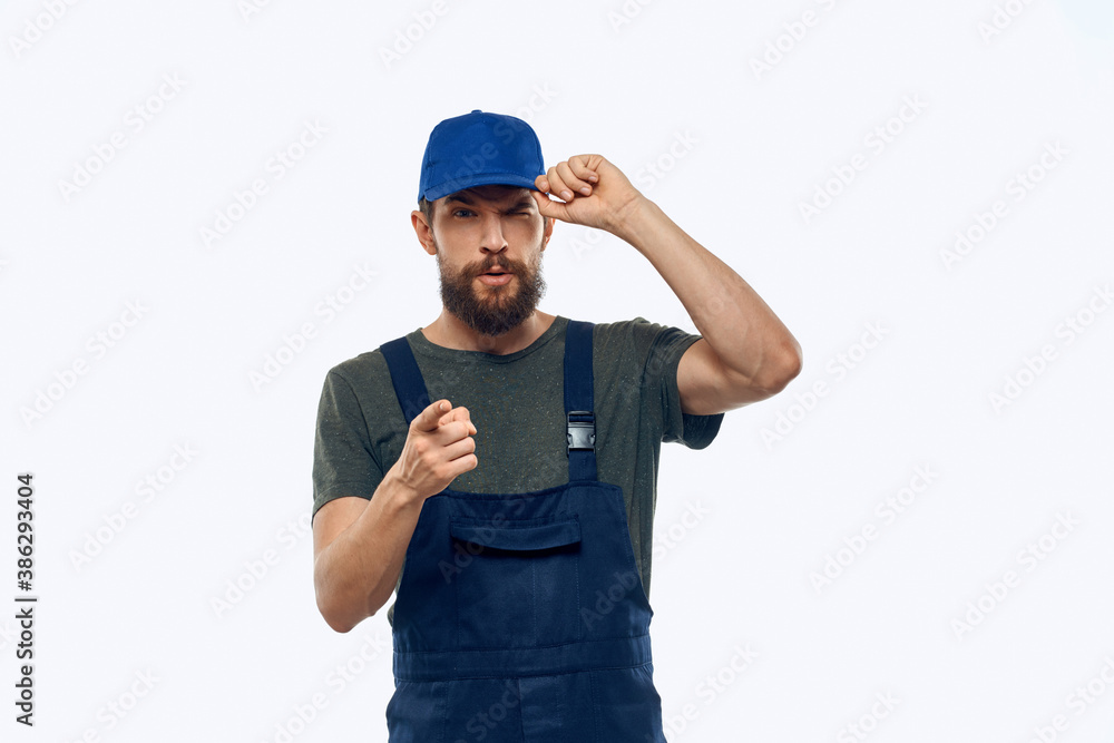 Worker man uniform delivery service emotions studio light background