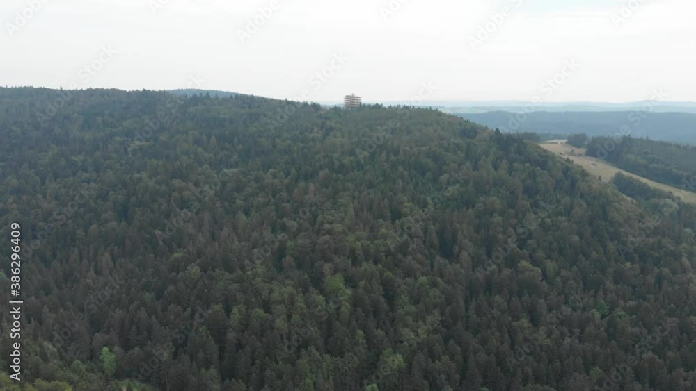 Treetop observation tower in resort town Krynica-Zdroj in summer. View from Jaworzyna Krynicka Mountain. Treetop observation tower in resort town Krynica-Zdroj in summer. View from Jaworzyna Krynicka Mountain.