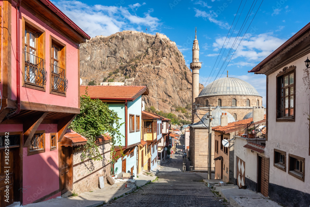 Street with traditional turkish ottoman houses in Afyonkarahisar city, Turkey