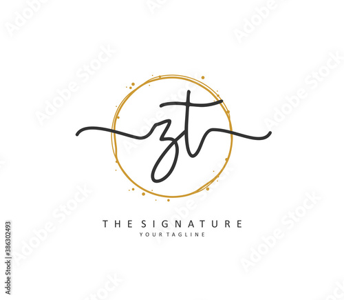 Z T ZT Initial letter handwriting and signature logo. A concept handwriting initial logo with template element. photo