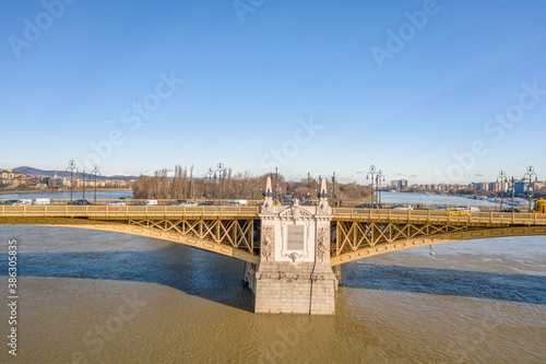 Aerial drone shot of Margret Bridge over Danube in Budapest winter morning with overcast photo