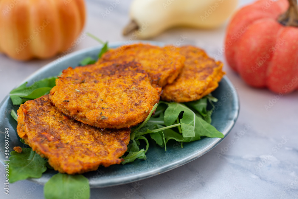 healthy home made pumkin patties with avocado and arugula salad healthy home made pumkin patties with avocado and arugula salad