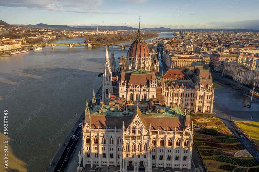 Aerial drone shot of Hungarian Parliament south side in Budapest winter morning glow