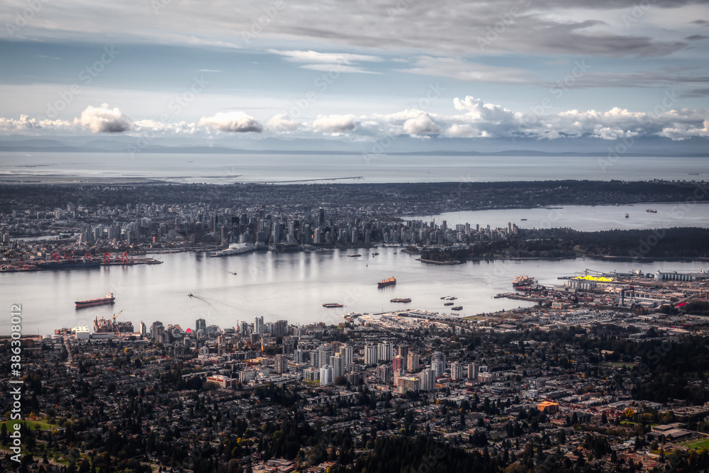 Aerial view of North Vancouver with Downtown City in the Background. Taken during sunny morning in British Columbia, Canada. Artistic Render Aerial view of North Vancouver with Downtown City in the Background. Taken during sunny morning in British Columbia, Canada. Artistic Render