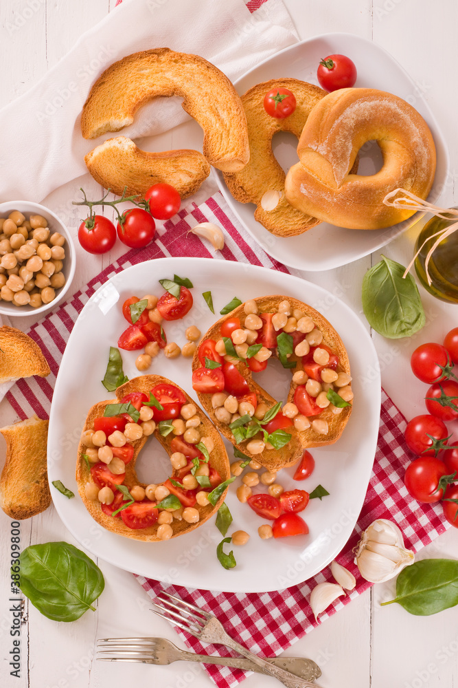 Friselle with tomatoes and chickpeas. Friselle with tomatoes and chickpeas.