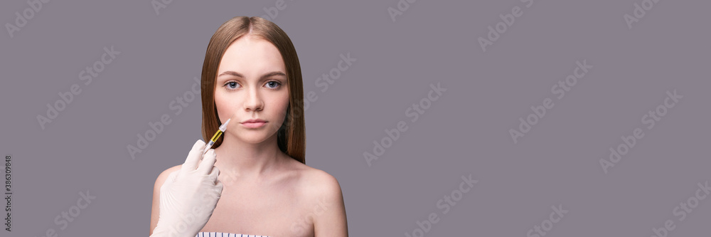 Closeup of rejuvenation lip. Beauty female face. Plastic surgery. Healthcare concept. Medical cosmetology, dermatology. Spa treatment. Doctor hands in medicine gloves. Horizontal banner with copyspace Closeup of rejuvenation lip. Beauty female face. Plastic surgery. Healthcare concept. Medical cosmetology, dermatology. Spa treatment. Doctor hands in medicine gloves. Horizontal banner with copyspace
