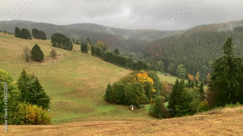 Mountain Neuastenberg with fog (Winterberg / Germany) photo