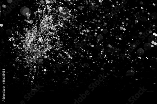 Gushing water, Splash of water on a black background