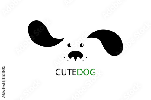 Cute cartoon dog face with long fluttering ears. Vector illustration photo