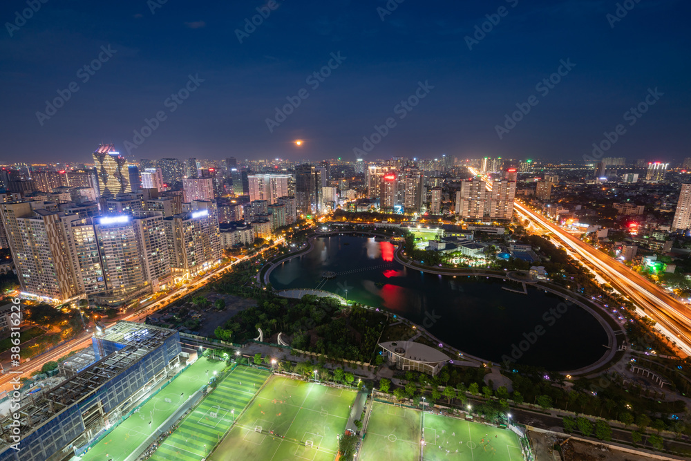 Fototapeta premium Hanoi skyline cityscape during sunset period at Nhan Chinh ward, Cau Giay district in 2020