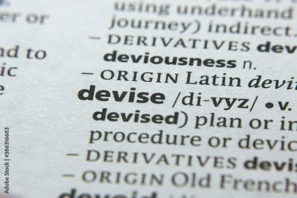 Obraz premium Word or phrase Devise in a dictionary.