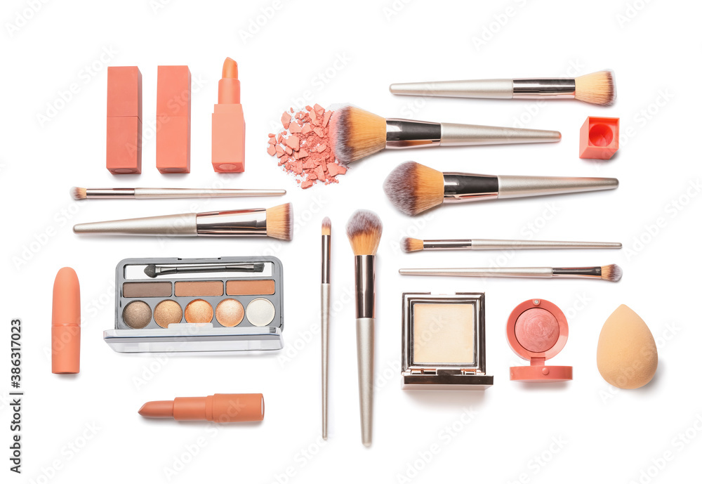 Set of makeup brushes with decorative cosmetics on white background - obrazy, fototapety, plakaty 