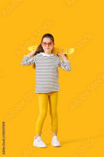 Cute little girl with skate...