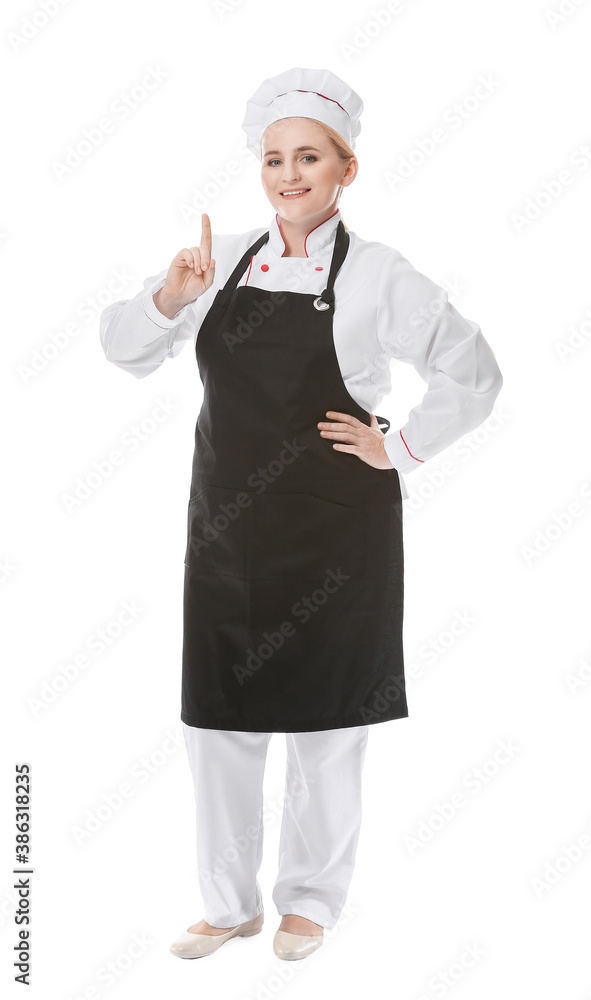 Mature female chef with raised index finger on white background Mature female chef with raised index finger on white background