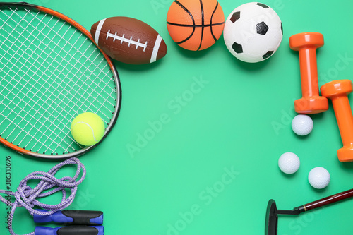 Set of sport equipment on color background