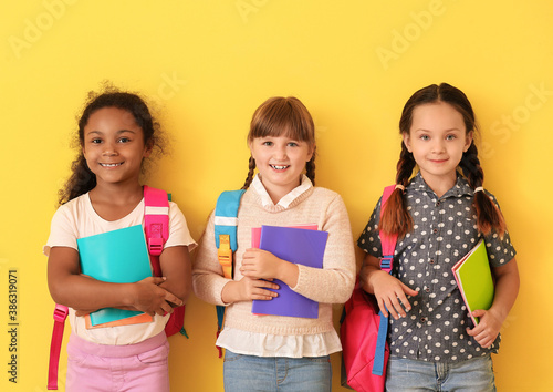 Cute pupils on color backgr...