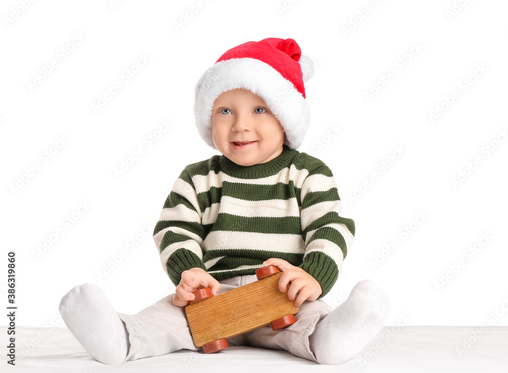 Cute little baby in Santa hat on white background Cute little baby in Santa hat on white background