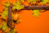 Halloween background or background for happy thanksgiving: ripe pumpkins and autumn leaves on the branches of trees: place for text