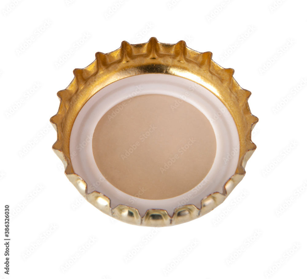 Metallic bronze beer cap isolated on the white Metallic bronze beer cap isolated on the white