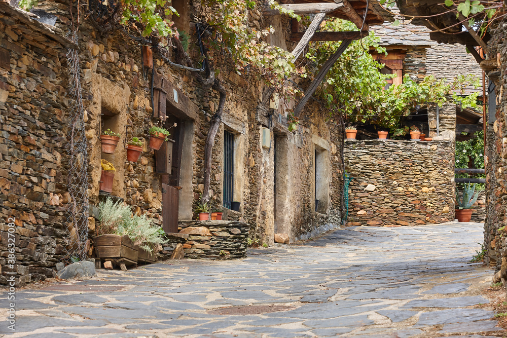 Traditional slate stone village Roblelacasa. Black architecture. Guadalajara. Spain