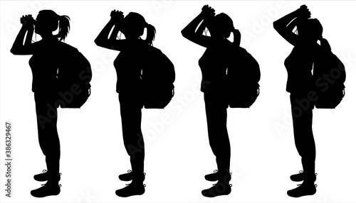 Tourists with large hiking backpacks behind their backs and binoculars in their hands. Girl on a hike. Ornithologist. Birdwatching. Four female black silhouettes are isolated on a white background.