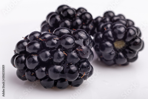 group of blackberries isolated on white background
