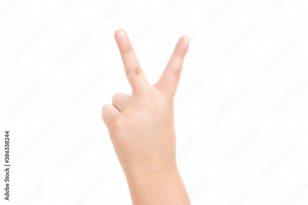 Boy's hand showing the sign of victory and peace close-up isolated on white background. Boy's hand showing the sign of victory and peace close-up isolated on white background.