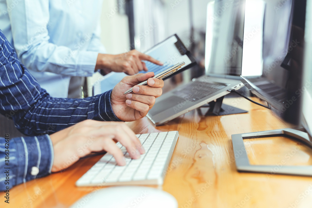 Investment concept, Investor calculating a valuation of stock market exchange, Selected focus. Investment concept, Investor calculating a valuation of stock market exchange, Selected focus.