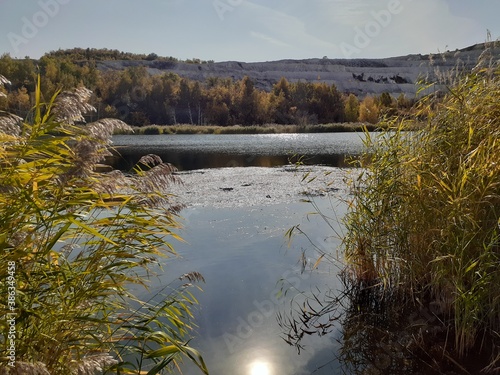 
lake in the forest in the Volskiy Cretaceous quarry, Saratov region, Russia