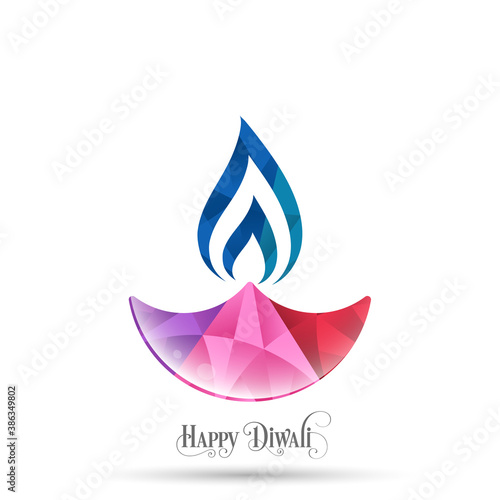 Happy Diwali greeting card with intricate calligraphy and illuminated Diwali lamp. photo