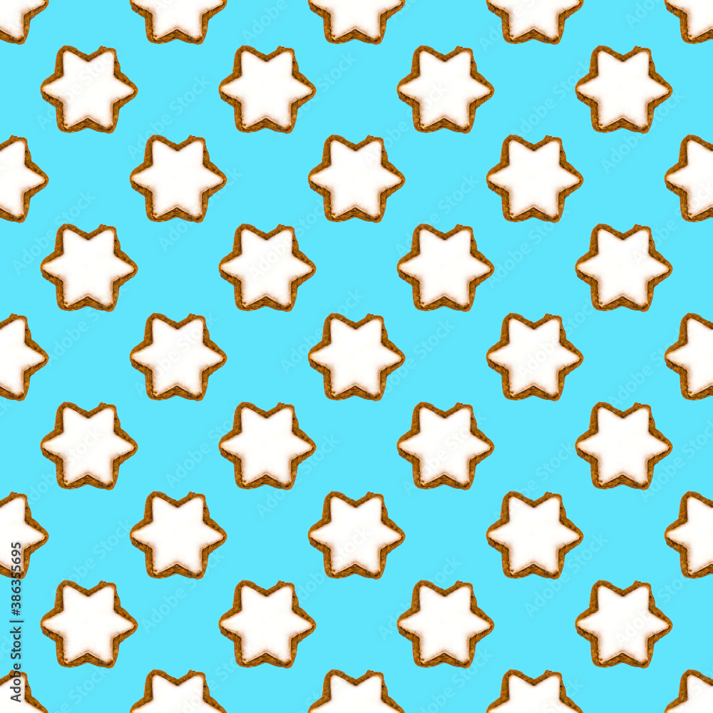 Cinnamon star cookie seamless pattern on blue background. Traditional german Christmas cookies. Print for paper, fabric or wallpaper with gingerbread. Christmas, New Year and winter holiday theme Cinnamon star cookie seamless pattern on blue background. Traditional german Christmas cookies. Print for paper, fabric or wallpaper with gingerbread. Christmas, New Year and winter holiday theme