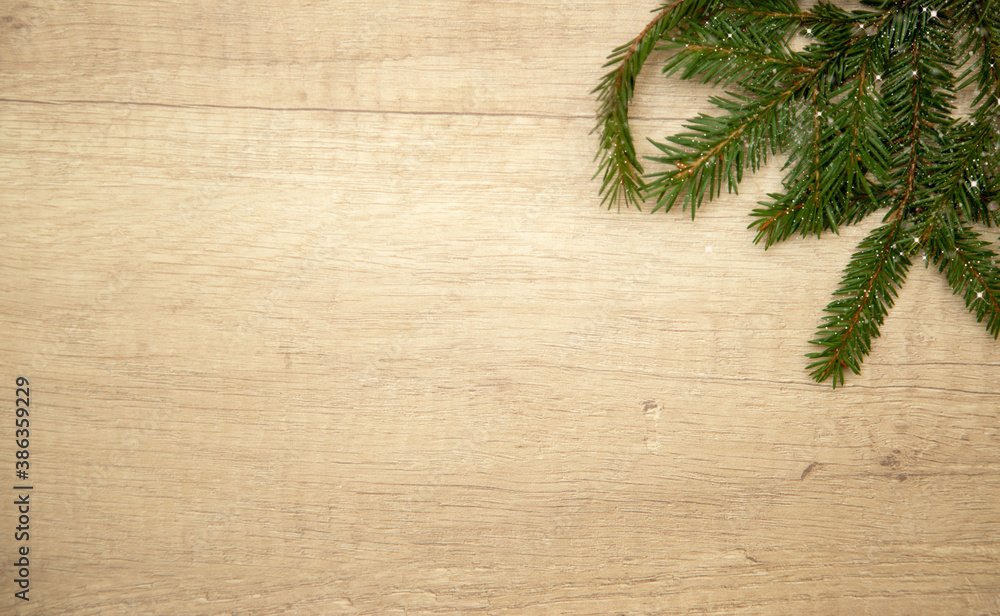 Christmas composition. fir branches on a light wooden background. Frame. Flat lay. Top view and copy space. Christmas composition. fir branches on a light wooden background. Frame. Flat lay. Top view and copy space.