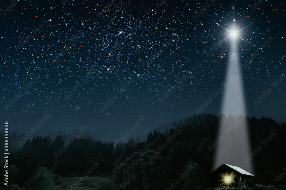 The star shines over the manger of christmas of Jesus Christ