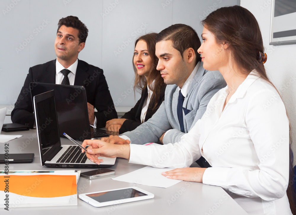 colleagues in negotiations in conference room colleagues in negotiations in conference room