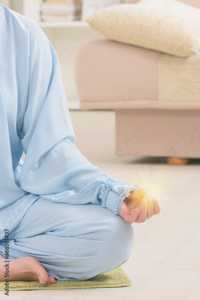Fototapeta premium Meditating sitting woman