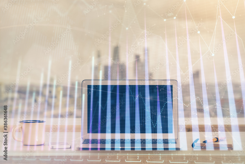 Stock market graph and table with computer background. Double exposure. Concept of financial analysis. Stock market graph and table with computer background. Double exposure. Concept of financial analysis.