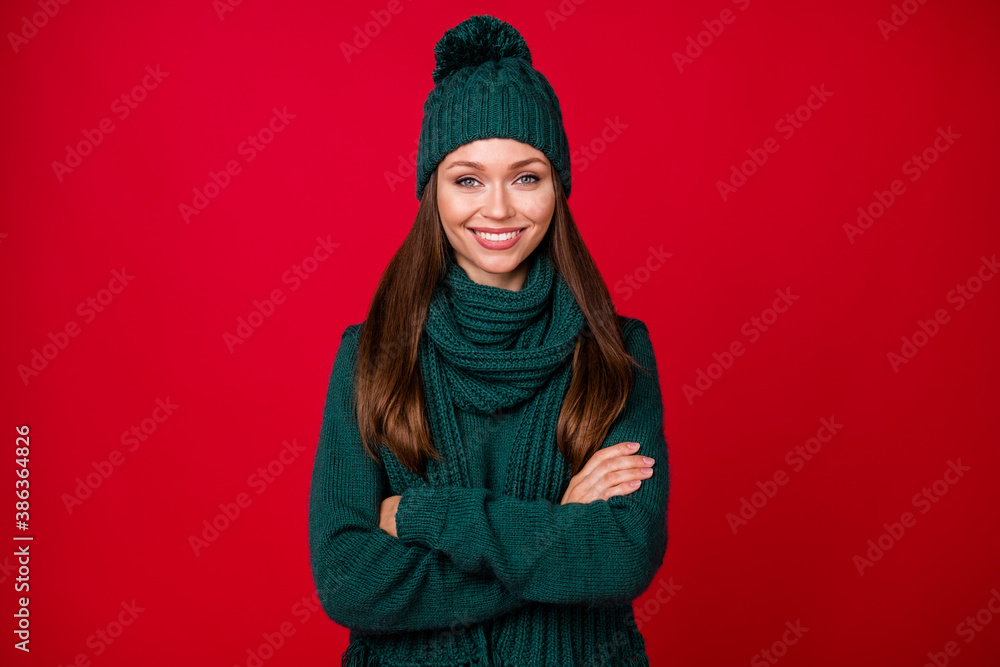 Portrait of her she nice attractive pretty charming lovely content cheerful cheery girl wearing wool clothes folded arms isolated over bright vivid shine vibrant red color background Portrait of her she nice attractive pretty charming lovely content cheerful cheery girl wearing wool clothes folded arms isolated over bright vivid shine vibrant red color background