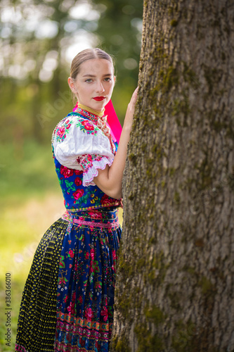 Slovak folklore. Slovak woman in traditional folk costume. © muro